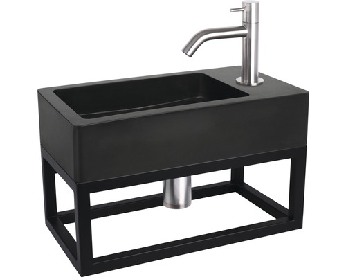 Waschtisch mit schwarzem Becken und Metallgestell sowie Armatur