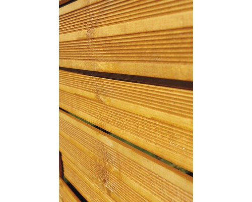 Detailaufnahme eines Zaunelements aus Holzlatten