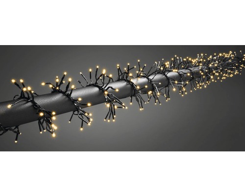 LED Büschellichterkette Konstsmide 7,2 m + Zuleitungslänge 5 m 960 LEDs Lichtfarbe bernstein inkl. Controller mit 8 Funktionen Lichterkette mit warmweißen Lichtern für den Innen- und Außenbereich