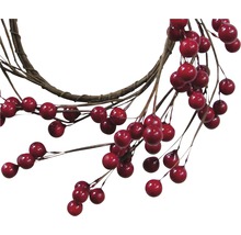 Dekorativer Kranz mit roten Beeren und Ästen