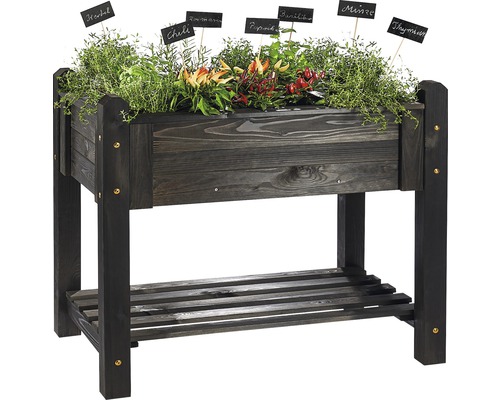 Hochbeet aus Holz mit Kräutern und Gemüsepflanzen