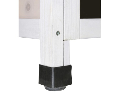 Detailaufnahme eines Möbelstücks mit einem Holzbein und einem schwarzen Eckschutz