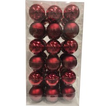Verpackung mit roten Weihnachtskugeln aus Kunststoff