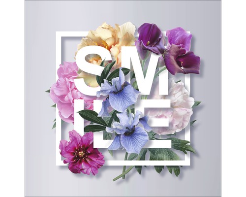Blumenarrangement mit Schriftzug in einem weißen Rahmen