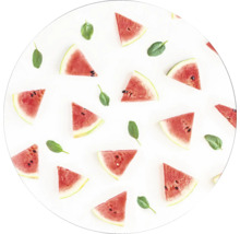Kreisförmiges Muster mit Wassermelonenscheiben und Blättern