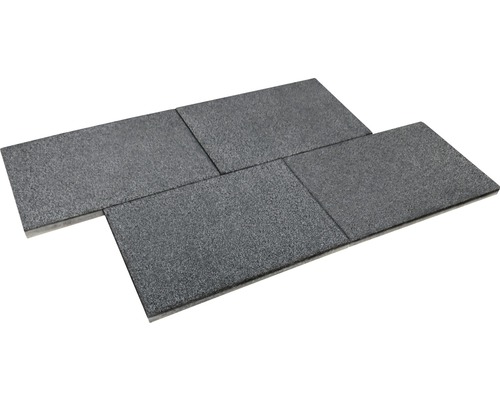 Vier Pflastersteine aus Beton