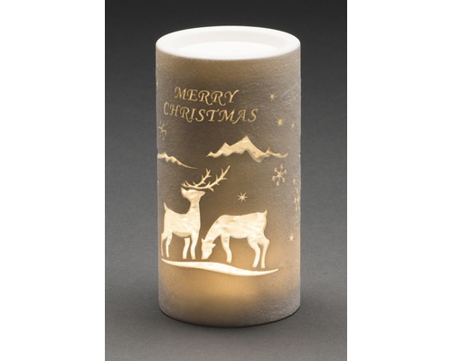 Dekorative LED-Kerze mit Weihnachtsmotiv und der Aufschrift Frohe Weihnachten.