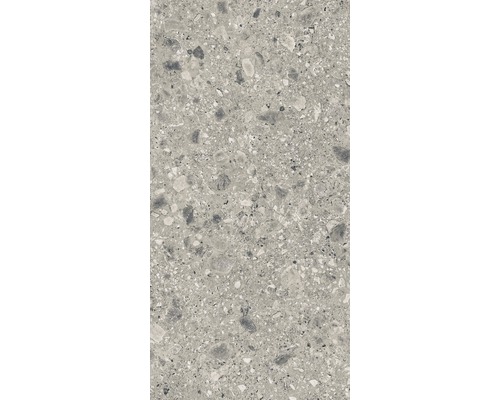 Nahaufnahme einer Bodenfliese mit Terrazzo-Optik.