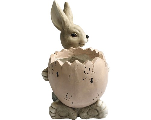Dekorative Hasenfigur in einer Eierschale als Pflanzgefäß.