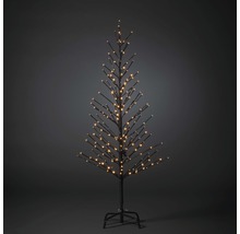 Dekorativer künstlicher Weihnachtsbaum mit Lichtern auf einem Ständer