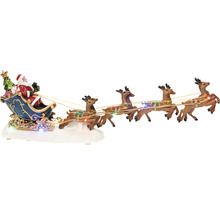 Dekorative Weihnachtsszene mit Weihnachtsmann im Schlitten, gezogen von Rentieren