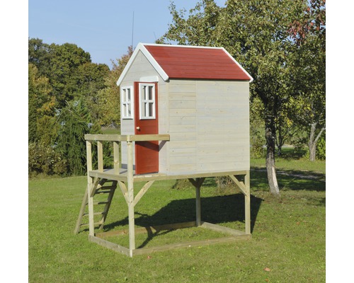 Spielhaus aus Holz mit rotem Dach auf Rasen