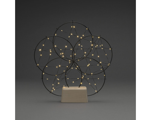 Dekorative Leuchte mit kreisförmigem Design und LED-Lichtern auf Holzsockel