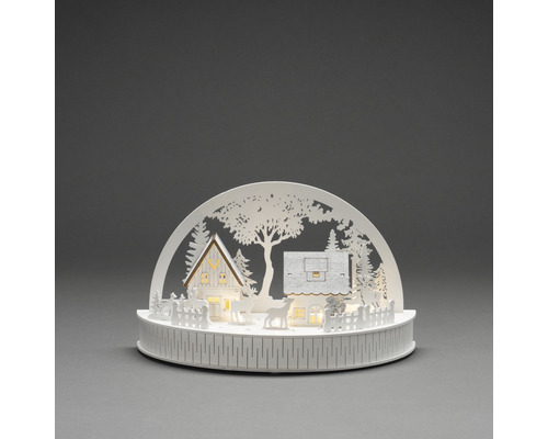 Dekorative Winterlandschaft mit Häusern und Tieren