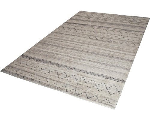 Teppich mit Streifen- und Zickzackmuster