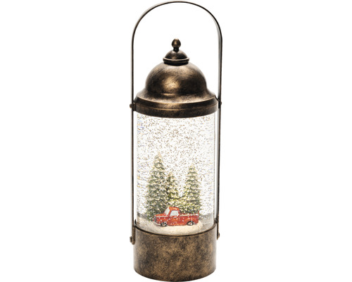 Dekorative Schneekugel Laterne mit rotem Pickup und Tannenbäumen