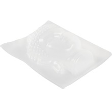 Buddha Kopf Form in einer Plastikverpackung