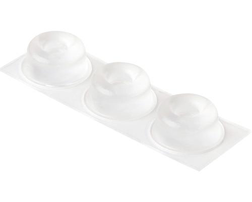 Drei transparente Möbelpuffer auf einer Kunststoffkarte