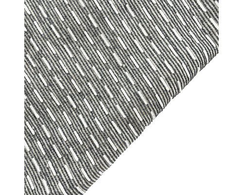 Dekorativer Stoff mit Streifenmuster und Stickerei