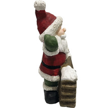 Weihnachtsmann Figur mit Leiter als Dekoration