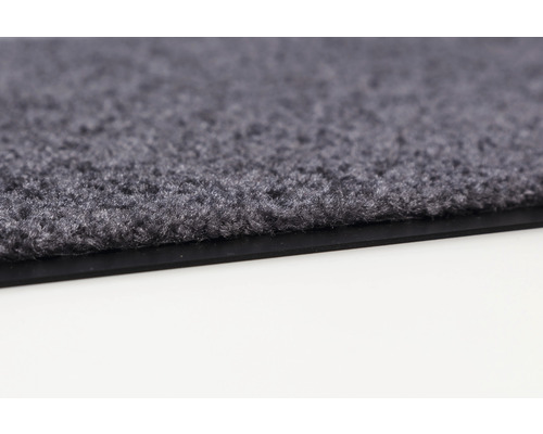 Detailaufnahme einer grauen Schmutzfangmatte mit Textiloberfläche und Gummirand