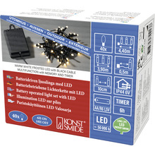 Verpackung einer batteriebetriebenen LED-Lichterkette mit warmweißen LEDs und schwarzem Kabel für den Außenbereich