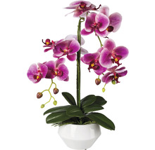 Künstliche Orchidee in weißem Topf