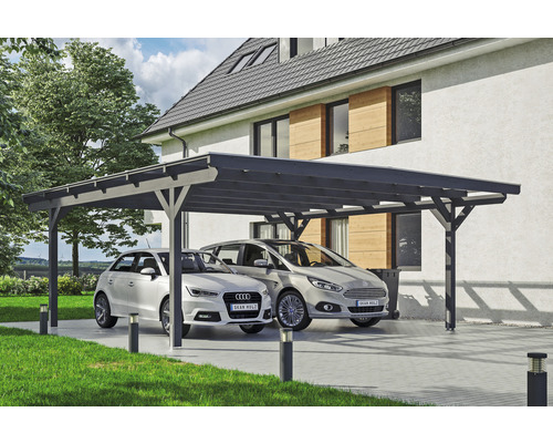 Doppelcarport aus Holz mit zwei geparkten Autos vor einem Haus