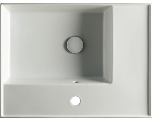 Aufsicht auf ein Waschbecken aus Sanitärkeramik mit Hahnlochbank