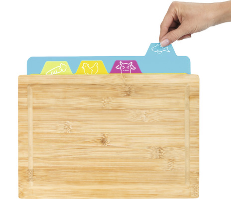 Schneidebrett aus Bambus mit austauschbaren Lebensmittel-Symbolen.