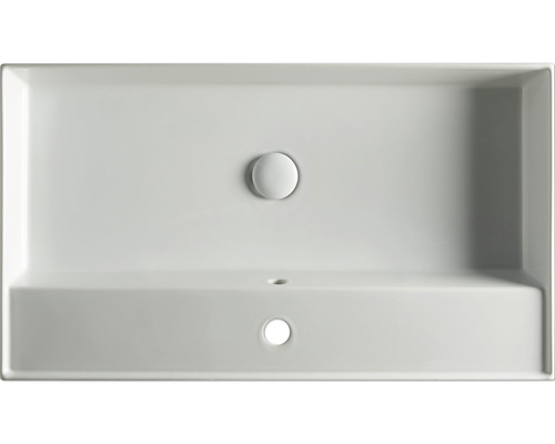 Aufsicht auf ein rechteckiges Waschbecken aus Keramik mit Abflussstopfen