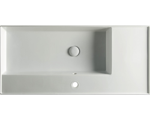 Aufsicht auf ein rechteckiges Waschbecken aus Keramik mit Hahnlochbank und Überlauf