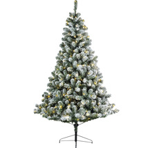 Geschmückter künstlicher Weihnachtsbaum mit Beleuchtung