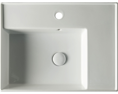 Aufsicht auf ein rechteckiges Keramikwaschbecken mit Überlauf