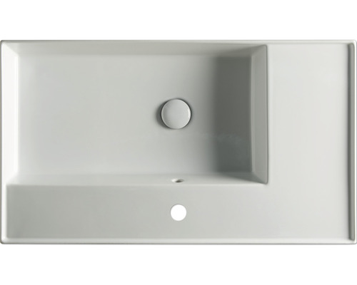 Aufsicht auf ein rechteckiges Waschbecken aus Keramik mit Hahnlochbank