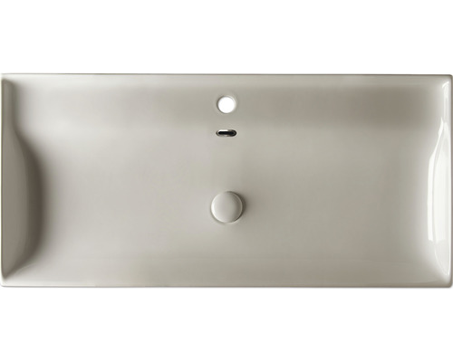 Auf der Draufsicht ist ein Waschbecken mit Überlauf und Ablauf dargestellt.