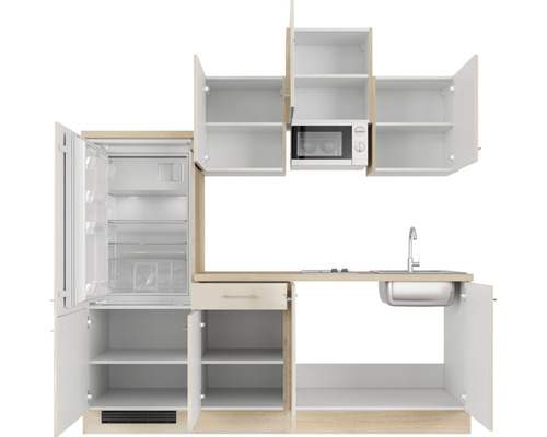 Küchenzeile mit Kühlschrank, Spüle, Mikrowelle und Stauraum