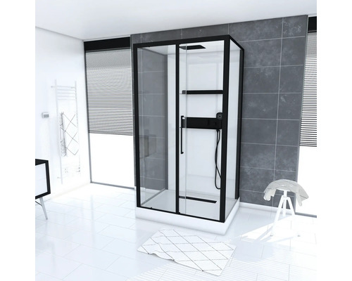 Dusche mit schwarzem Rahmen in einem hellen Badezimmer.