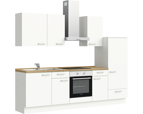 Komplette weiße Küche mit Spüle, Herd, Backofen, Dunstabzugshaube und Schränken