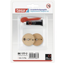 Tesa Ersatzbefestigungsset mit zwei Adaptern, Tube Klebstoff und Applikationshilfe in Verpackung