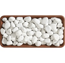 Dekosteine aus Marmor in einer braunen Schale