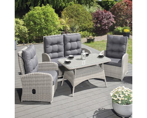 Gartenmöbelset mit Tisch, Stühlen und Bank mit Polstern auf einer Terrasse