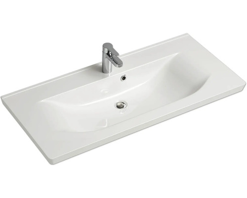 Waschtisch aus Keramik mit Armatur