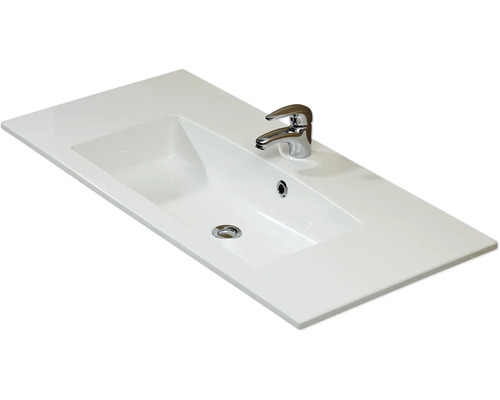 Waschtischplatte mit eingelassenem Waschbecken und Armatur