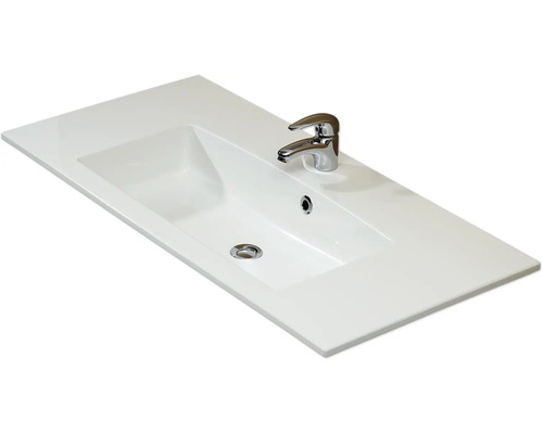 Waschtischplatte mit eingelassenem Waschbecken und Armatur