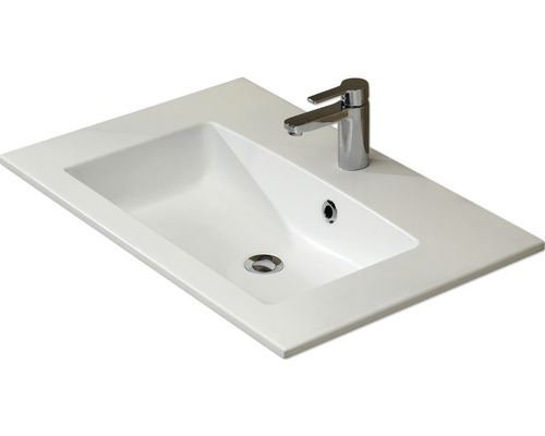 Waschtisch aus Sanitärkeramik mit Armatur