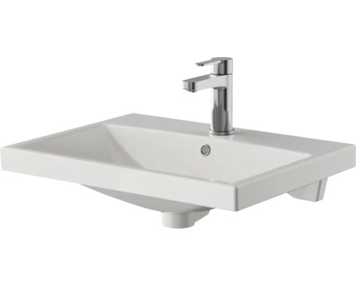 Weißes Keramik Waschbecken mit Armatur