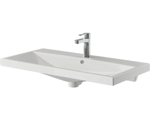 Waschtisch aus Keramik mit Armatur