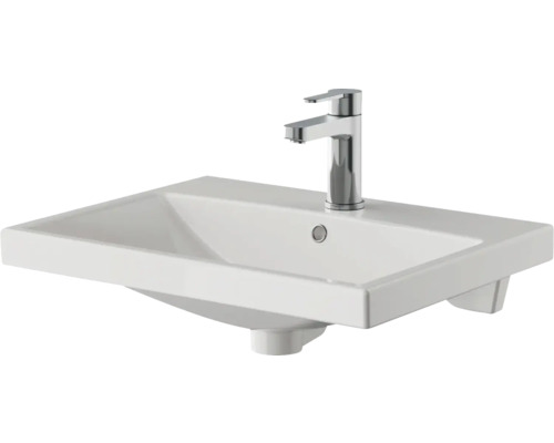 Waschtisch aus Keramik mit Armatur