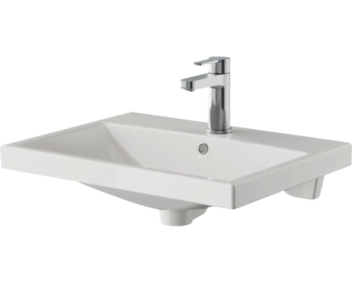 Weißes Keramik Waschbecken mit Armatur